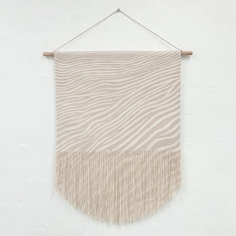 Sand Dune Block Print Fringe Wall Hanging in Taupe