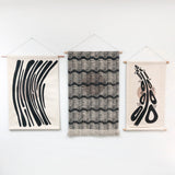 Wave with Circle Wall Hanging in Black and Taupe