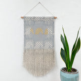 Grey Gateway with Taupe Circle and Gold Wall Hanging
