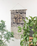 Patchwork Wall Hanging in Black with Circle and Gold