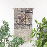 Patchwork Wall Hanging in Black with Circle and Gold