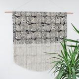 Patchwork Block Printed Fringe Wall Hanging in Back