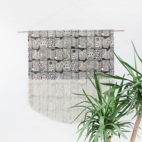 Patchwork Block Printed Fringe Wall Hanging in Back